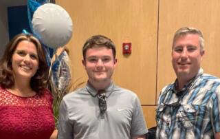 Julleanna and Adrian Seely with Byron Outten Memorial Scholarship winner, Connor Jonathan McLaughlin