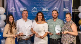 Photo shows the Team at Seely Homes who earned 7 Regal Awards from Delaware Association of Home Builders. Pictured L to R: Cassie Davis, Adrian Seely, Julleanna Seely, Nathaniel Maynard, and Colleen Watson