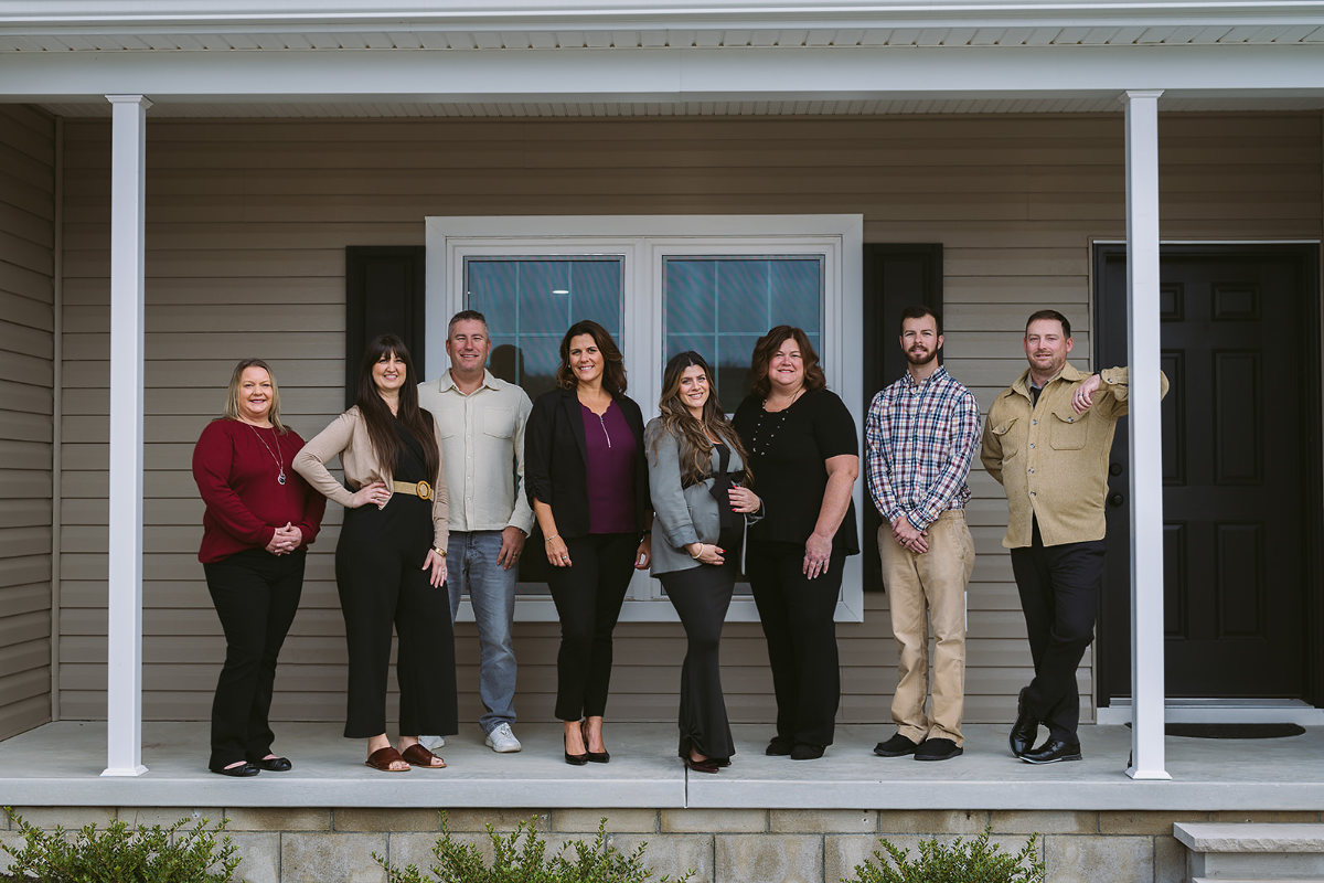 Seely Homes Team Seely Homes Team on porch of home